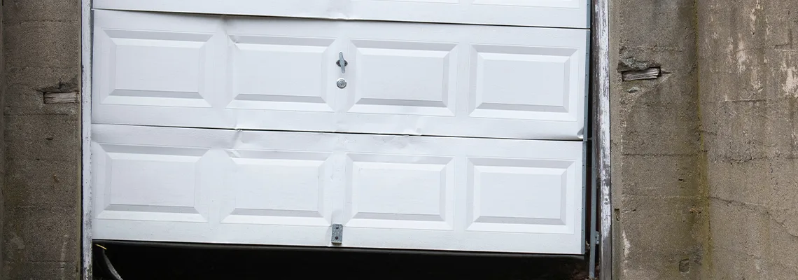 Garage Door Got Hit By A Car Dent Removal in Markham, ON