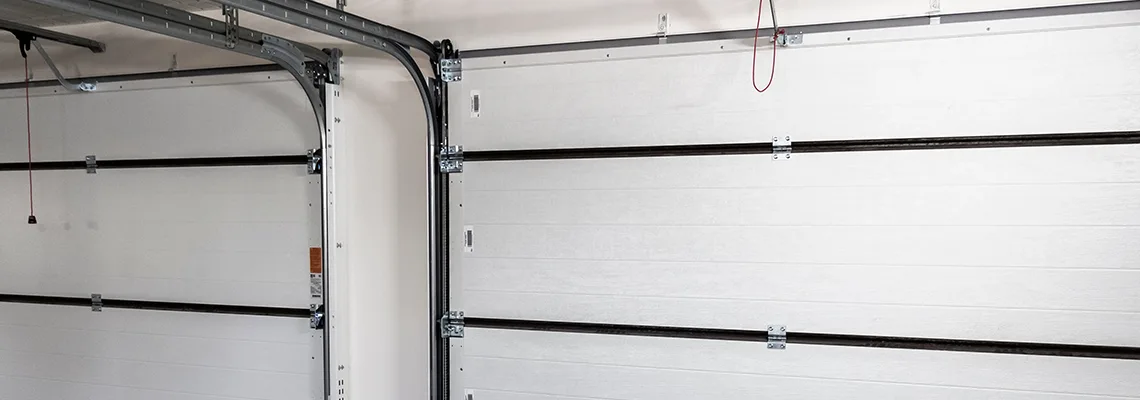 Fix Folding Garage Door Jerking in Markham, Ontario