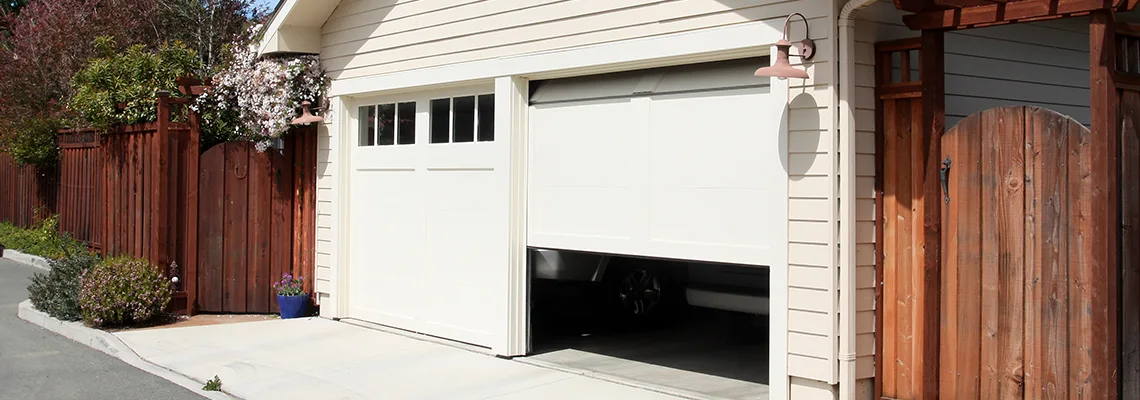 Fix Metal Garage Door Jerking in Markham, Ontario